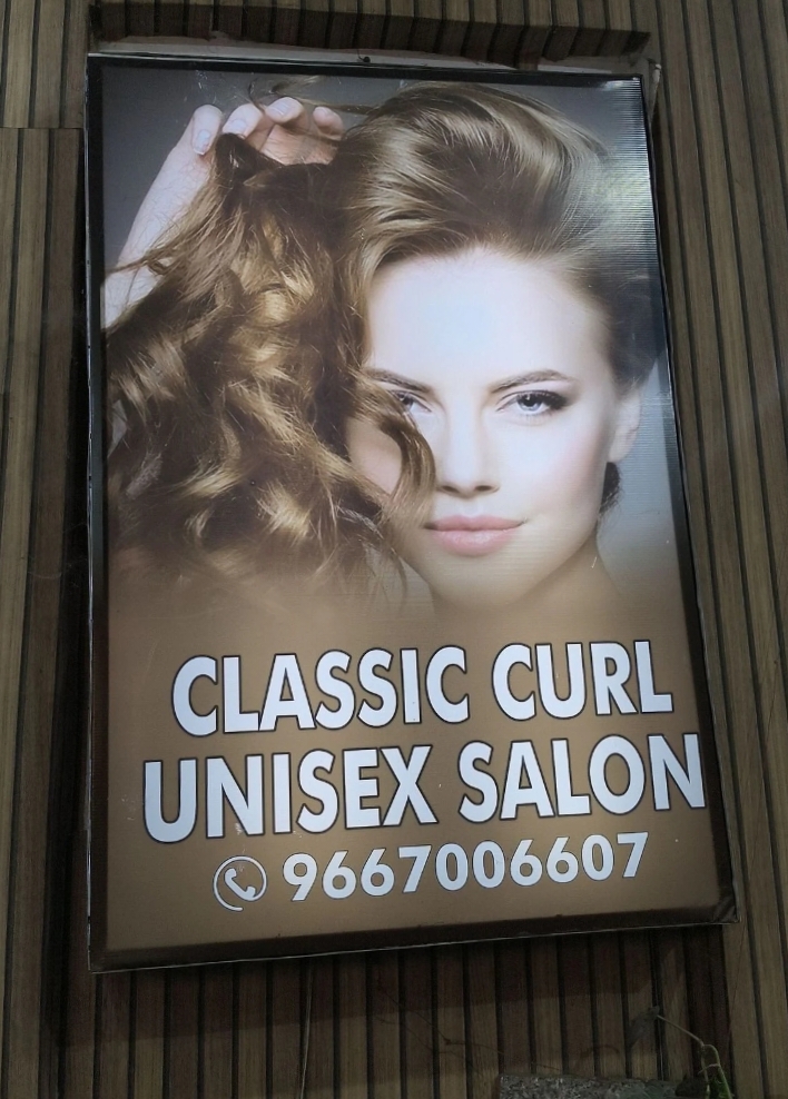 Classic Curl signboard with phone number
